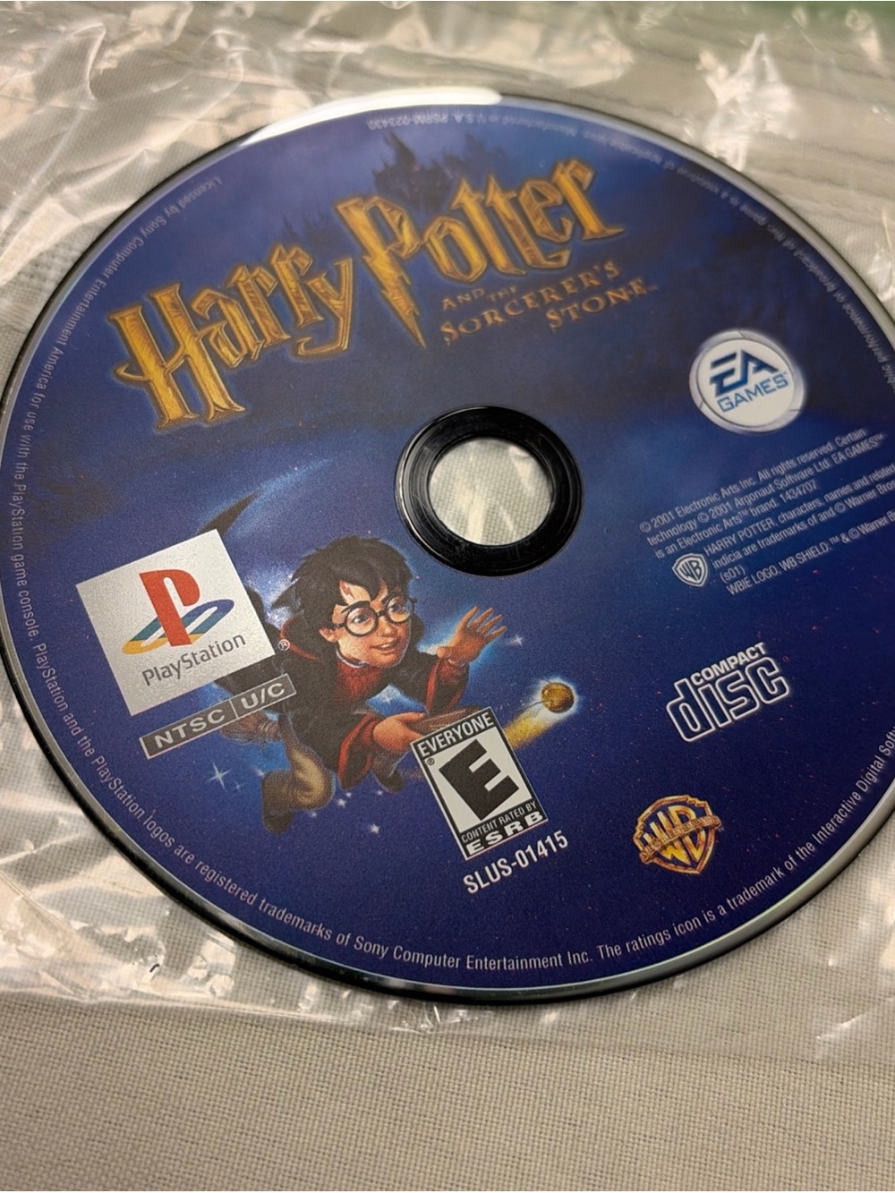 Harry Potter and the Sorcerer's Stone PlayStation Game Disc - Blue